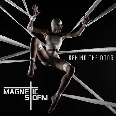 Behind the Door by Magnetic Storm - album cover
