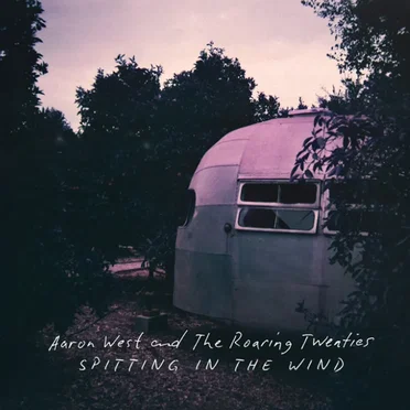Spitting In The Wind by Aaron West and The Roaring Twenties - album cover