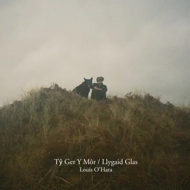 Tŷ Ger Y Môr / Llygaid Glas