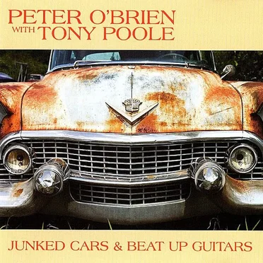 Junked Cars & Beat Up Guitars