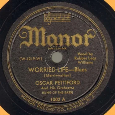 Worried Life / Empty Bed Blues – Part I by Oscar Pettiford and His Orchestra (King of the Bass) - album cover