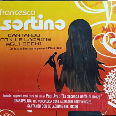 Cantando con le lacrime agli occhi