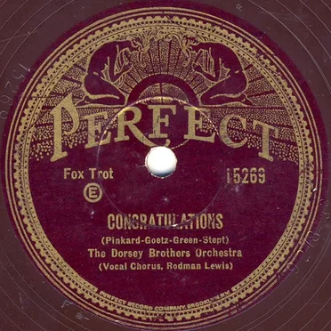 Congratulations / Beside an Open Fireplace