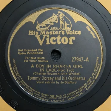 A Boy in Khaki–A Girl in Lace / In the Blue of Evening