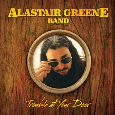 Trouble At Your Door by Alastair Greene Band - album cover