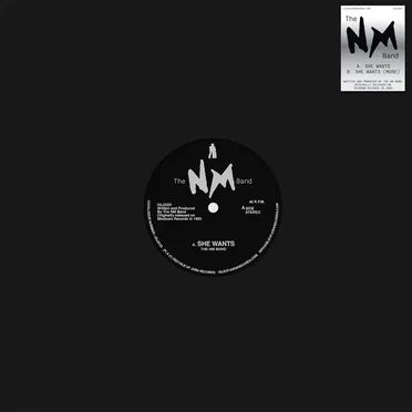 She Wants by The N.M. Band - album cover