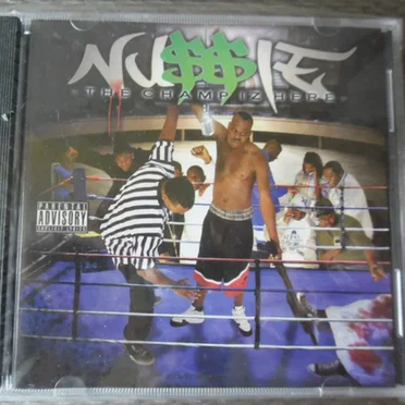 The Champ Iz Here by Nu$$ie - album cover