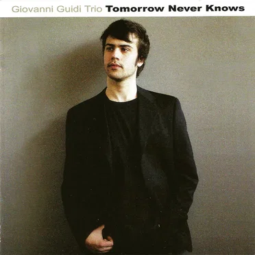 Tomorrow Never Knows by Giovanni Guidi Trio - album cover