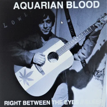 Right Between The Eyes by Aquarian Blood - album cover