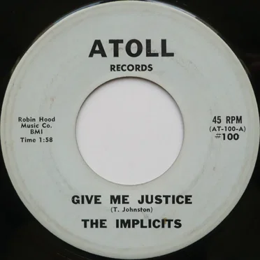 Give Me Justice / She's Alright by The Implicits - album cover