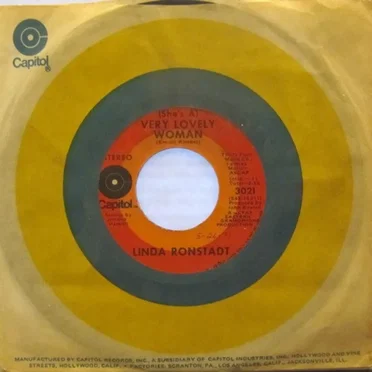 The Long Way Around / (She’s a) Very Lovely Woman