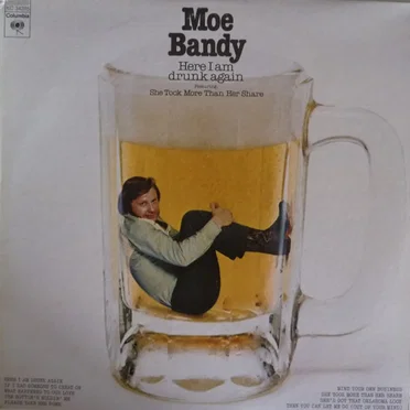 Here I Am Drunk Again by Moe Bandy - album cover