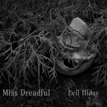 Evil Hides by Miss Dreadful - album cover