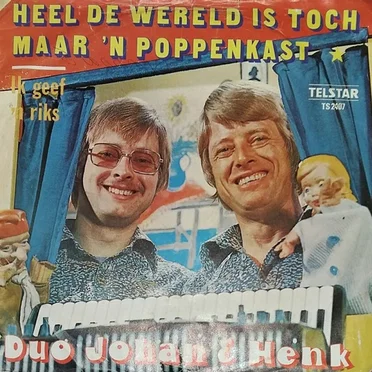 Heel de wereld is toch maar een poppenkast / Ik geef een riks voor je gedachten