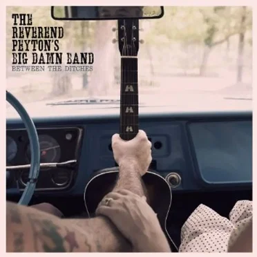 Between the Ditches by The Reverend Peyton’s Big Damn Band - album cover