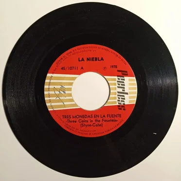 Tres monedas en la fuente / El adiós