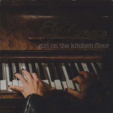 Girl on the Kitchen Floor