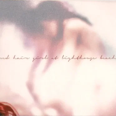 Red Hair Girl at Lighthouse Beach