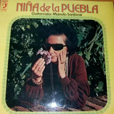 Niña De La Puebla