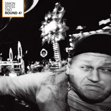 Round 4! by Simon Spiess Trio - album cover
