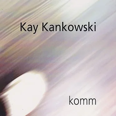 komm