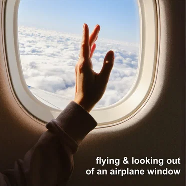 flying & looking out of an airplane window by Various Artists - album cover
