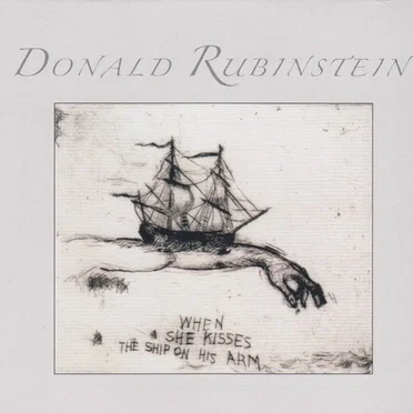 When She Kisses The Ship On His Arm