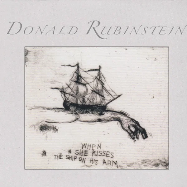 When She Kisses The Ship On His Arm