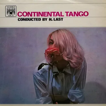 Orchestra conducted by H. Last