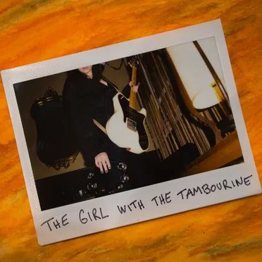 The Girl With The Tambourine
