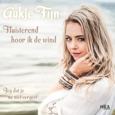 Fluisterend hoor ik de wind / Zeg dat je me niet vergeet
