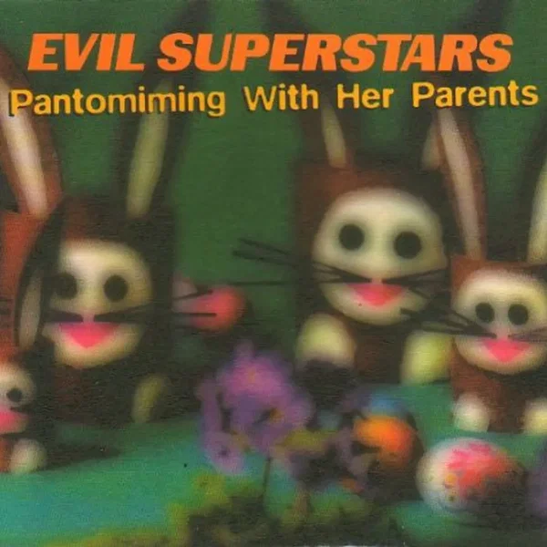 Pantomiming With Her Parents