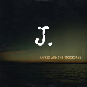 J.