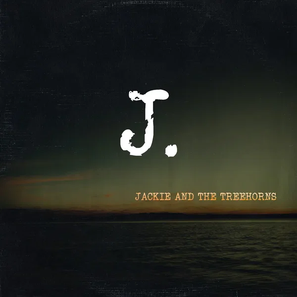J.