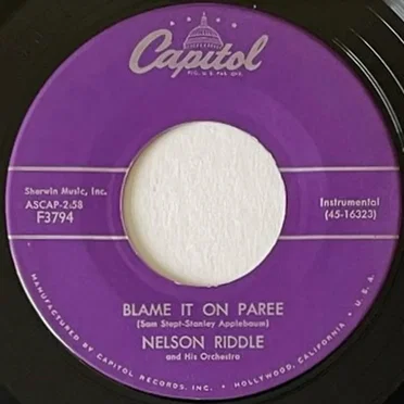 Blame It on Paree / In a Small Forgotten Town