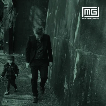 MG