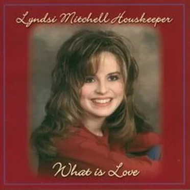 What is Love by Lyndsi Mitchell Houskeeper - album cover