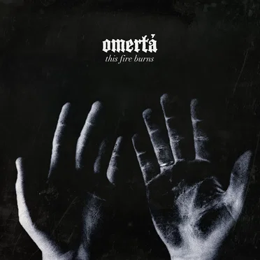 This Fire Burns by Omertá - album cover