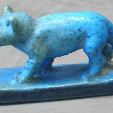 Blue Egyptian faience cat figurine dated to 1981−1802 BC by https://en.wikipedia.org/wiki/Felis_catus - album cover