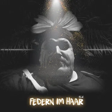Federn im Haar