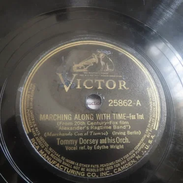 Marching Along With Time / This Time It’s Real