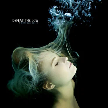 A Nervous Smile by Defeat The Low - album cover