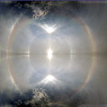 each raindrop is a sphere (that scatters light over the sky)