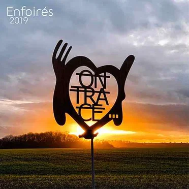 On trace by Les Enfoirés - album cover