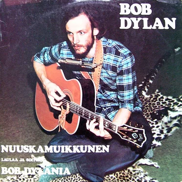 Laulaa ja soittaa Bob Dylania