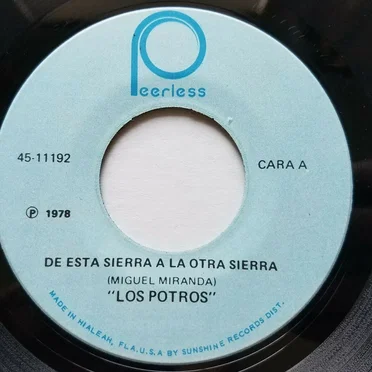 De esta sierra a la otra sierra / La vi partir