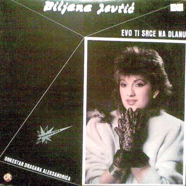Evo Ti Srce Na Dlanu