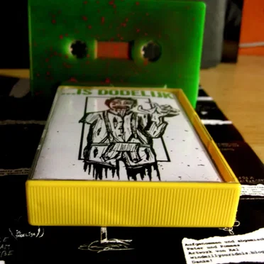 Demotape by ... IS DODELIJK - album cover
