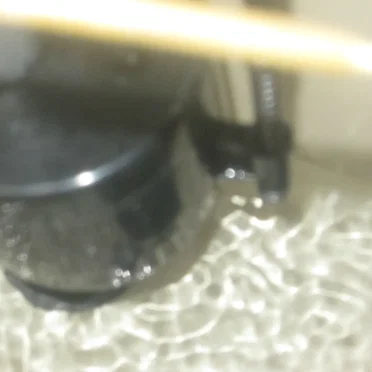 Back of Toilet Water Running