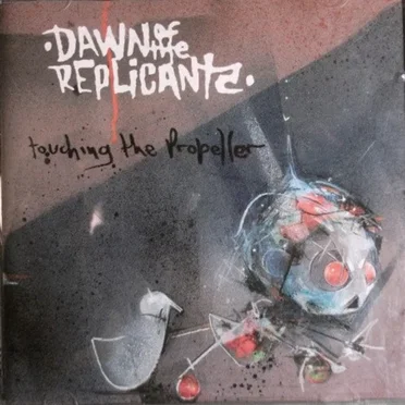 Touching the Propeller by Dawn of the Replicants - album cover